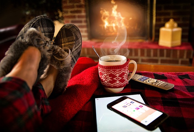 hot beverage in front of a fireplace