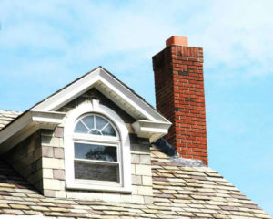 brick chimney with blue sky