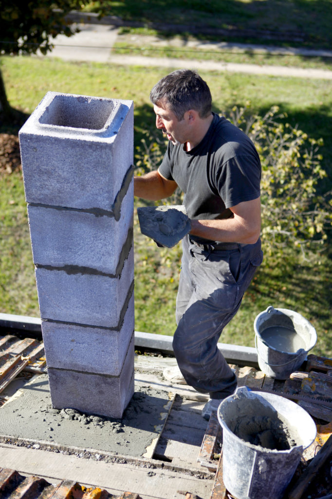 mason building a chimney